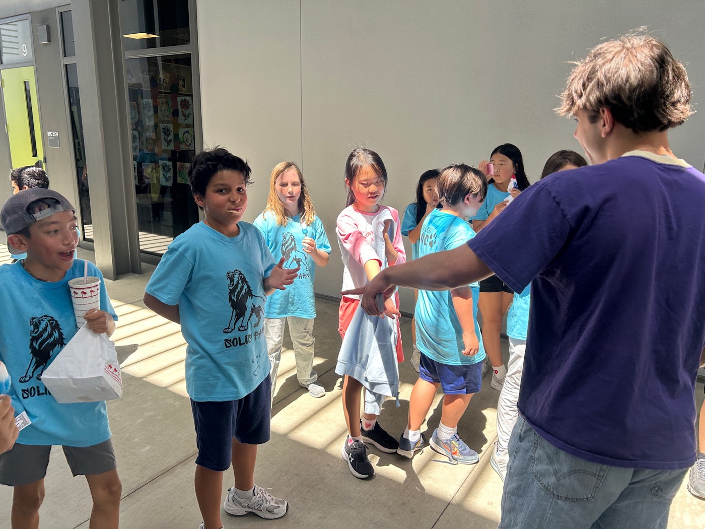 Kids lining up after a workshop